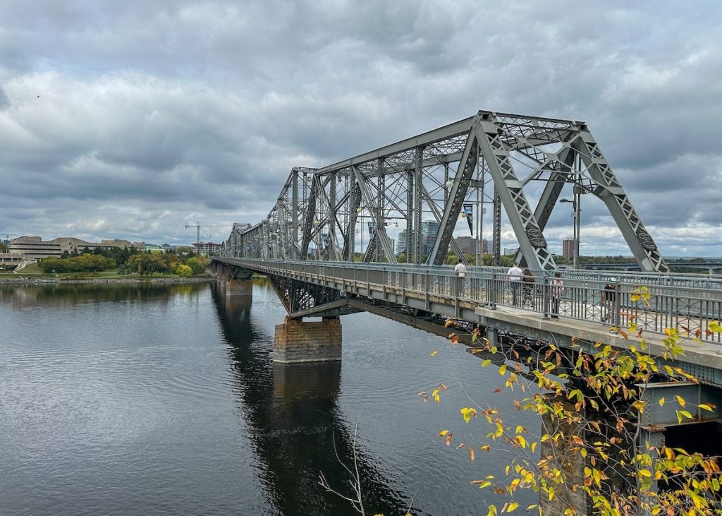 Walking across the beautiful Alexandra Bridge for stunning views of Ottawa.
