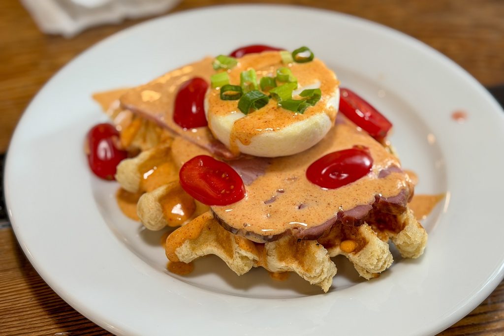 Enjoying a savoury waffle at Sonder Coffee.