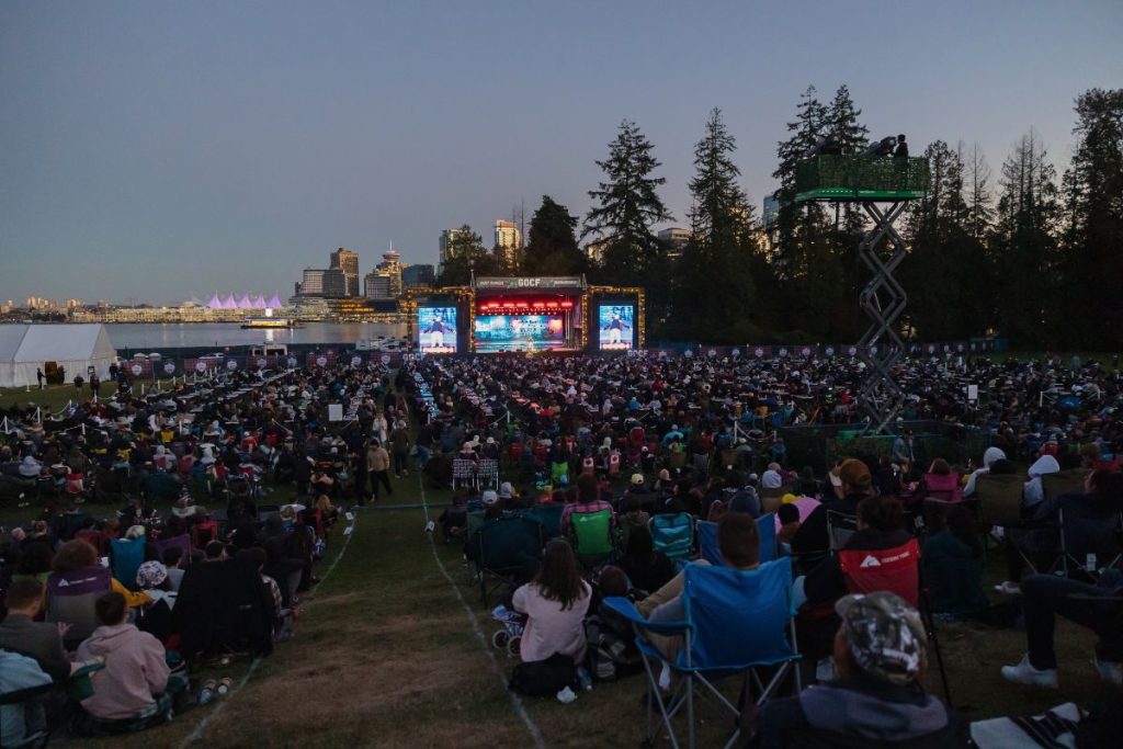 Watching the Great Outdoor Comedy Festival in Vancouver, BC.